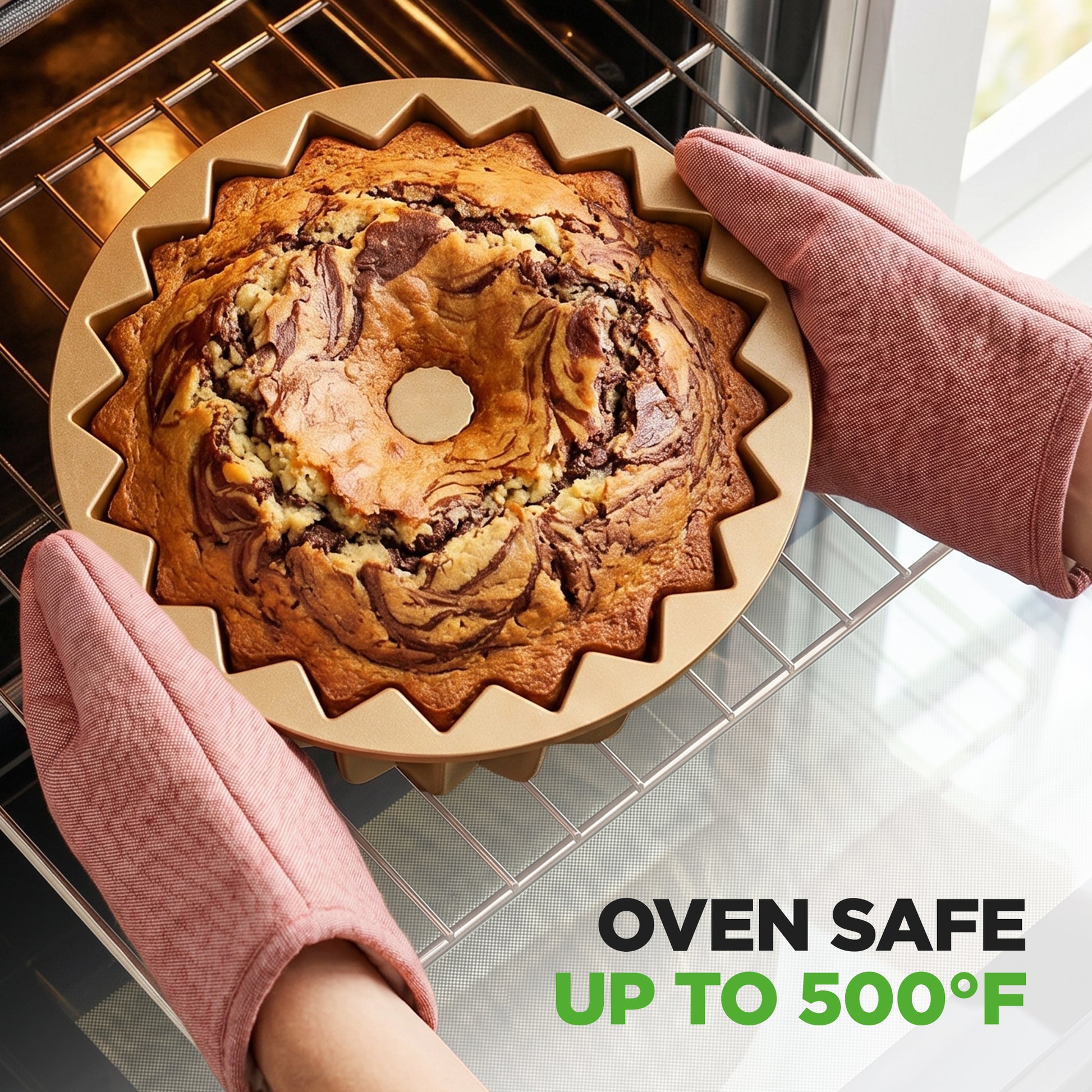 Bundt cake in a gold pan being removed from an oven with text 'Oven Safe Up to 500°F'.