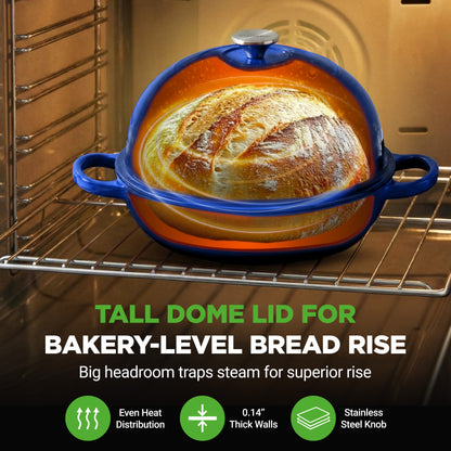 Baked bread in a blue dome-shaped baking dish cast iron pot