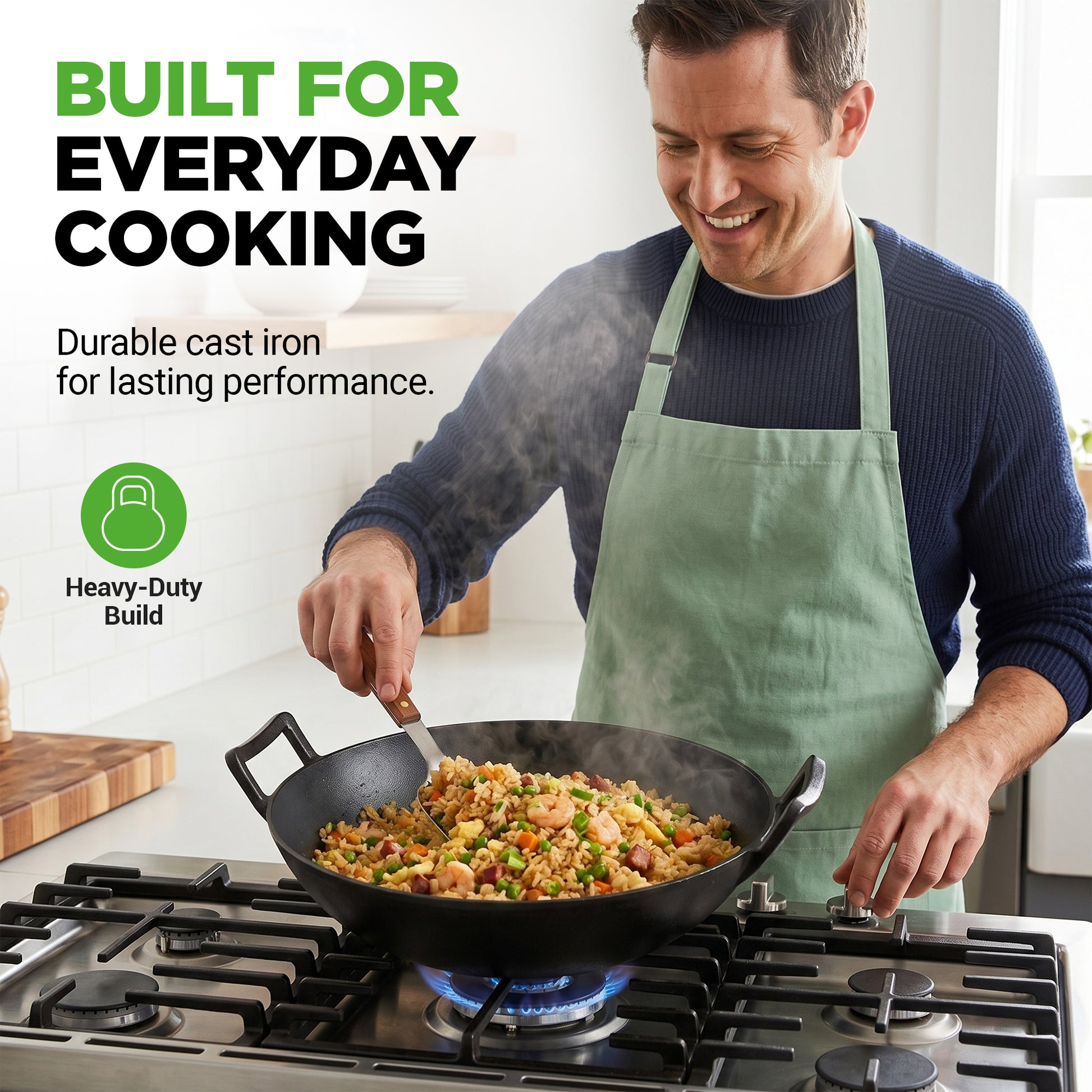 Man cooking in a kitchen with a wok on a stove, wearing a green apron.