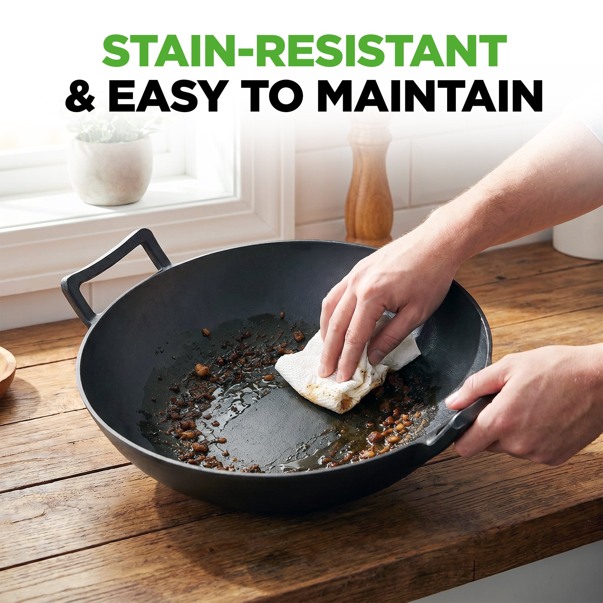 Person cleaning a stained wok with text 'Stain-Resistant & Easy to Maintain' in a kitchen setting.