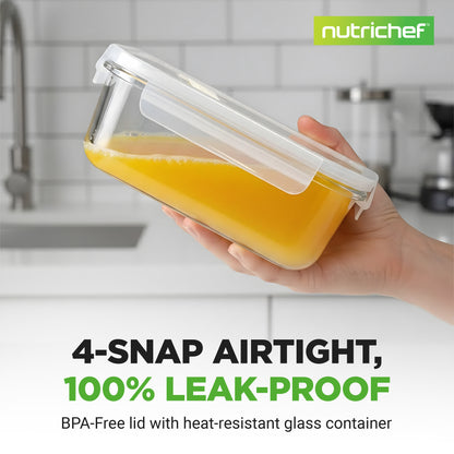A hand holds a clear glass food storage container with a transparent snap-lid lid, partially filled with orange juice, against a blurred kitchen background. The brand name 'nutrichef' appears in a green box at the top right, and marketing text at the bottom reads '4-SNAP AIRTIGHT, 100% LEAK-PROOF' and 'BPA-Free lid with heat-resistant glass container.