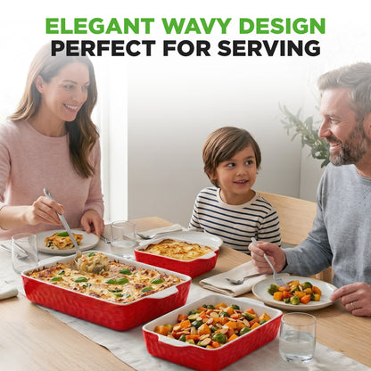 Family enjoying a meal together with red casserole dishes on a table.