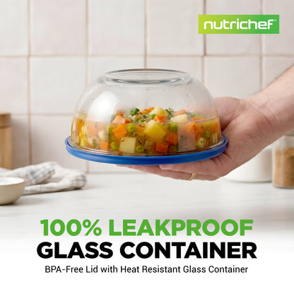 A hand holds a clear glass food container with a blue rim and a transparent dome lid, shown in a kitchen setting. The image includes the text '100% LEAKPROOF GLASS CONTAINER' and the 'nutrichef' brand logo.