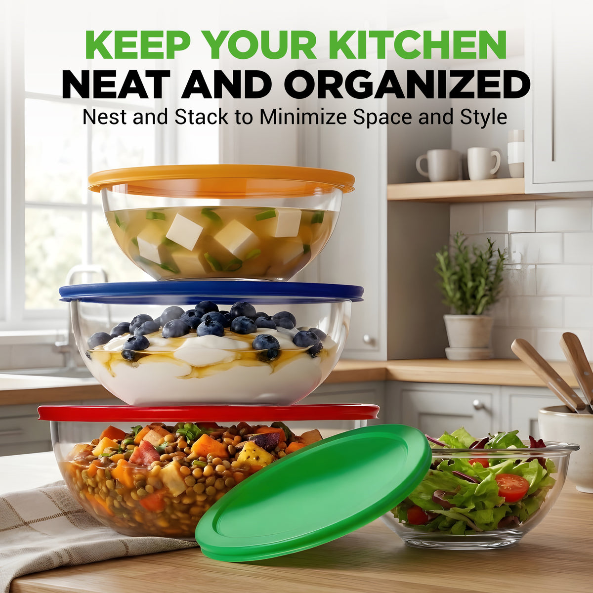 Stackable glass bowls with colorful lids on a kitchen counter, promoting organization.