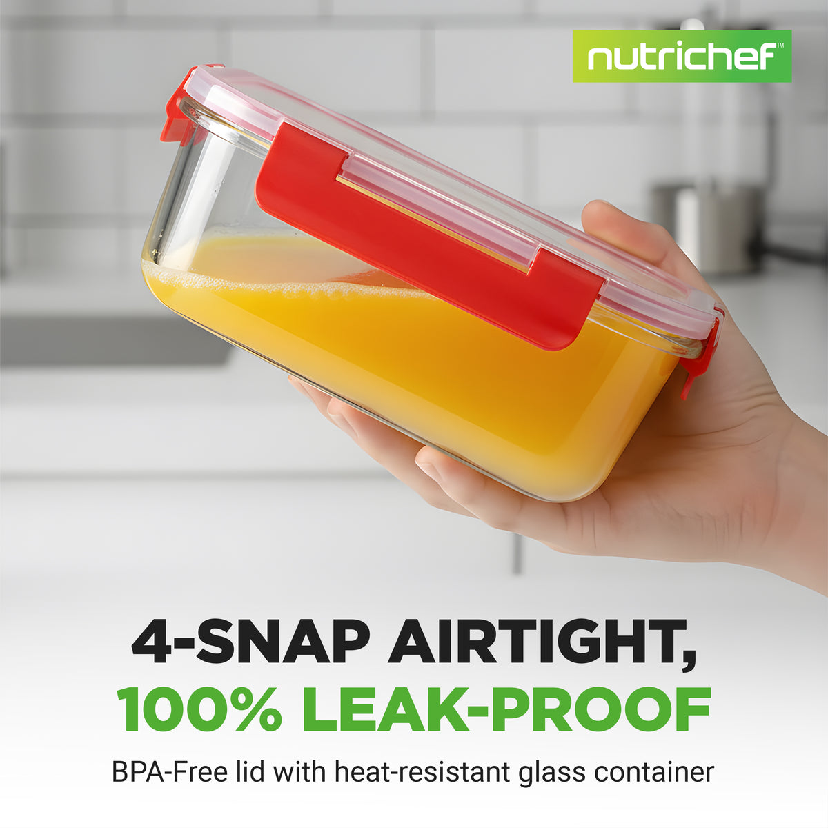 Hand holding a glass container with a red lid filled with orange juice, branded 'NutriChef'.