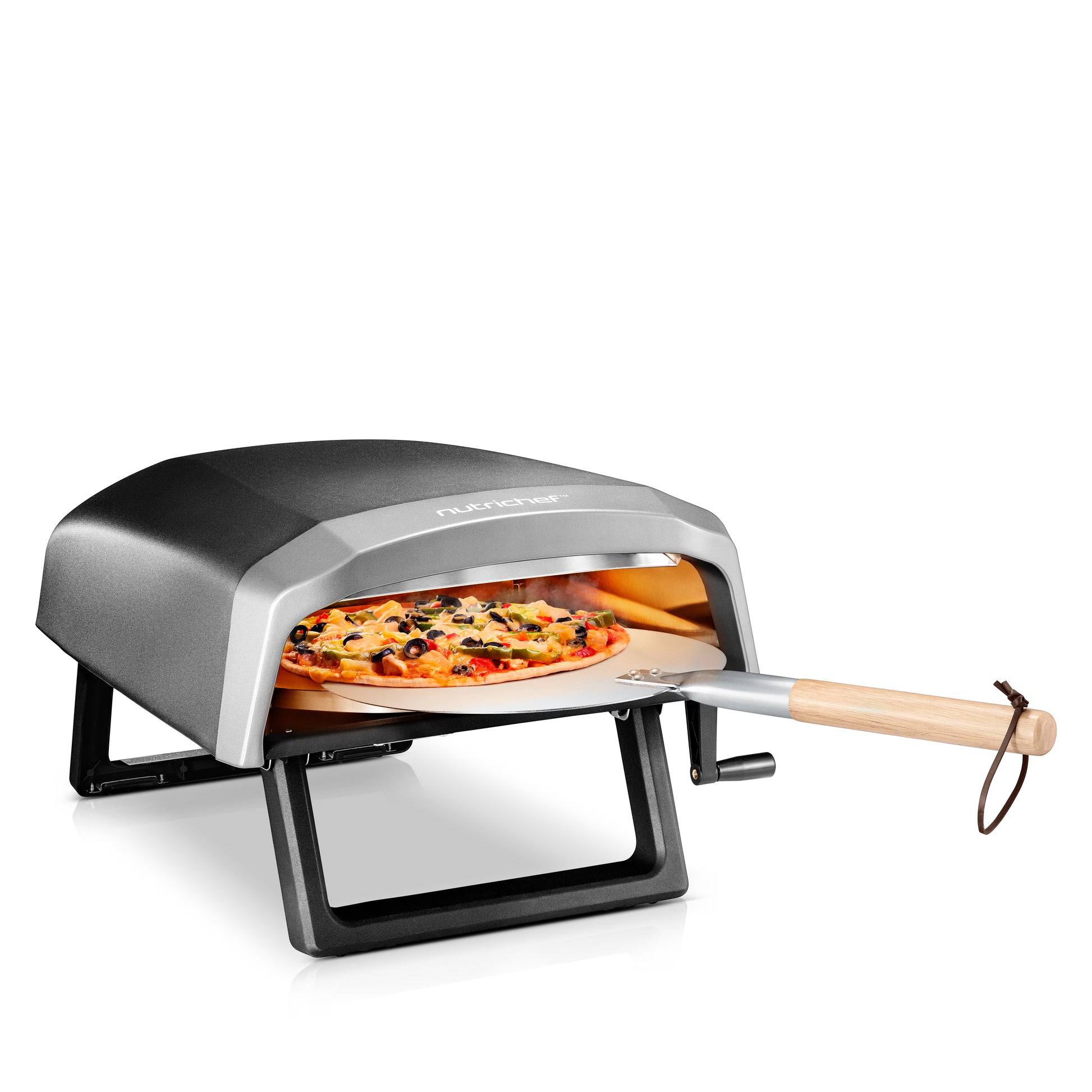 Portable pizza oven with a pizza inside and a pizza peel on a white background