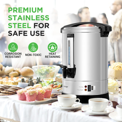 Stainless steel hot water dispenser on a table with food and people in the background, emphasizing safety features.