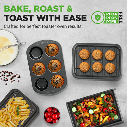 Set of baking and roasting pans with baked goods on a gray surface, featuring text about PFOA, PFOS, and PTFE-free materials.