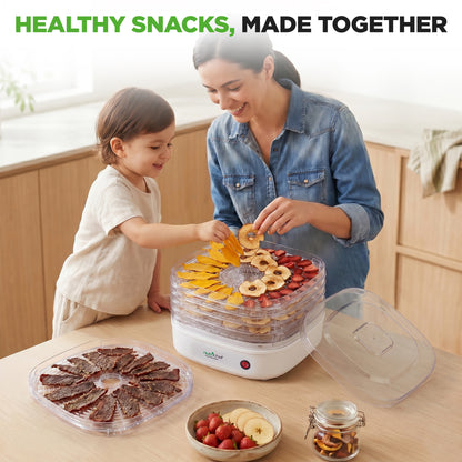 Woman and child using th nutrichef  food dehydrator with text 'Healthy Snacks, Made Together' in a kitchen setting.